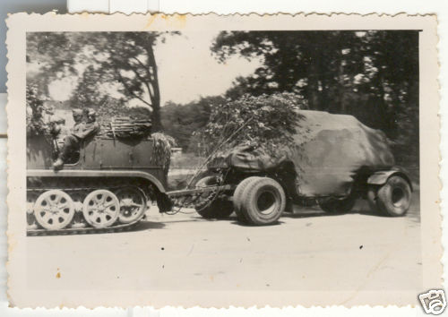 21cm%20K39%20or%2024cm%20H39%20carriage%20trailer%20being%20towed%20by%20a%20SdKfz%207%20halftrack.jpg